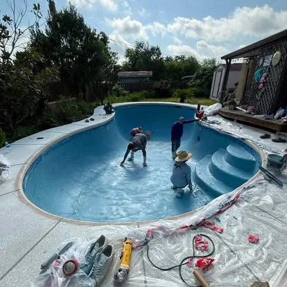 Cascada crew finishing a backyard pool